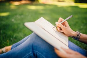 writing in the park, girl 